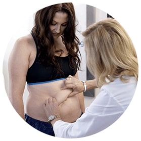 image of a dermatologist working with a patient during coolsculpting appointment
