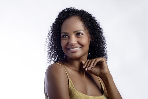 Woman in her 50s looks young for her age thanks to non-surgical skin care.